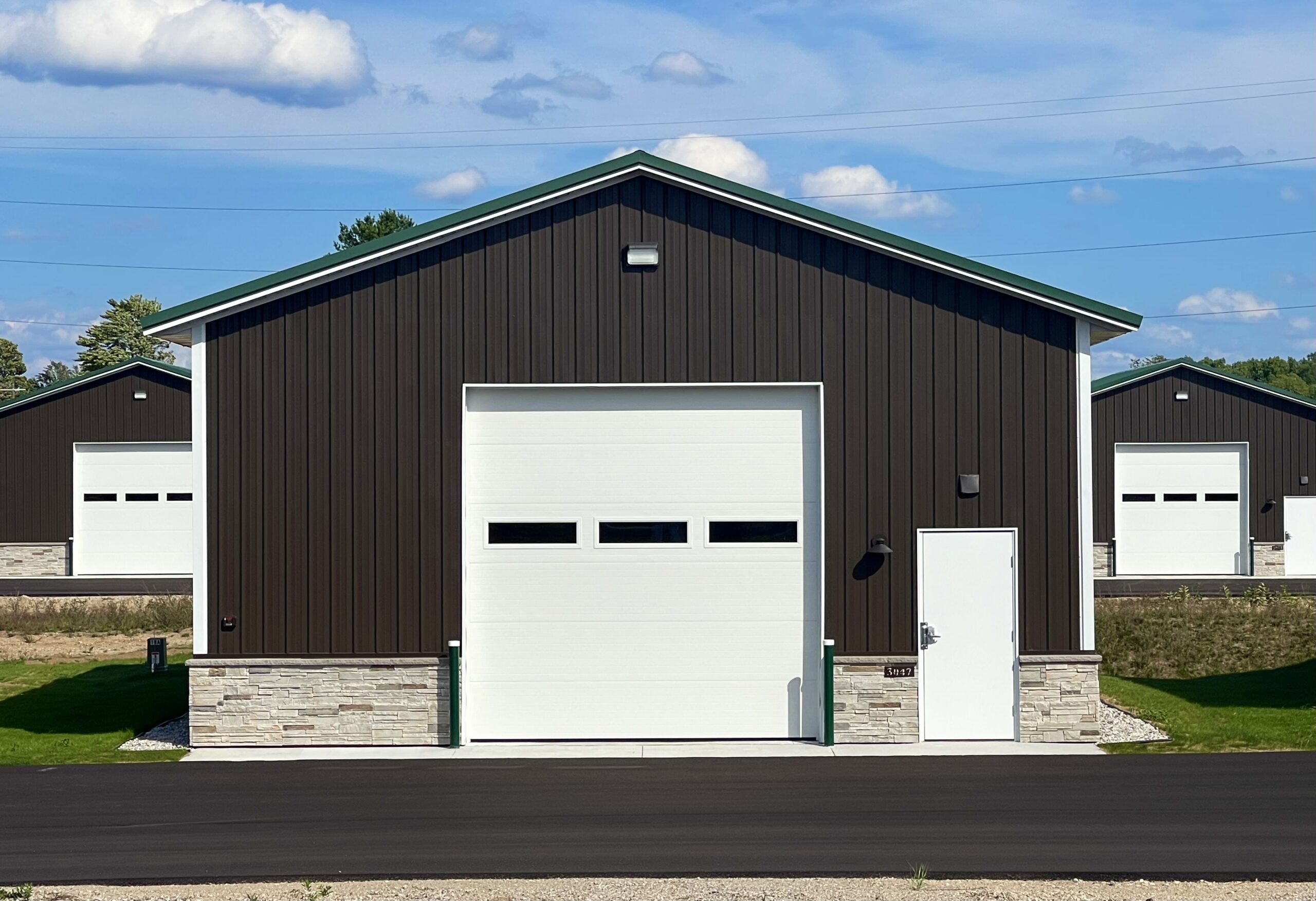 Luxury storage barns M37 roundabout Traverse City toybox heated pole building man cave warehouse commercial